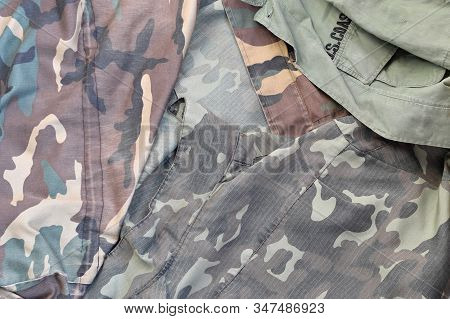 Camouflage Background Texture As Backdrop For Military Service Design Projects