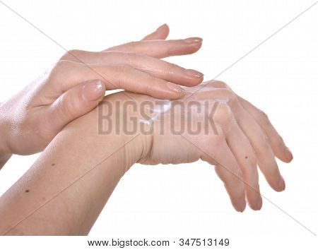 Closeup Shot Of Beautiful Female Hands  Applying Moisturiser