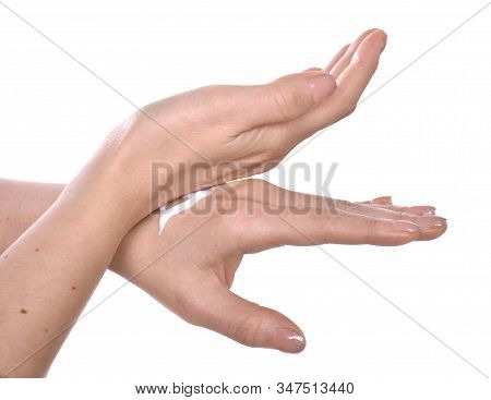 Closeup Shot Of Beautiful Female Hands  Applying Moisturiser