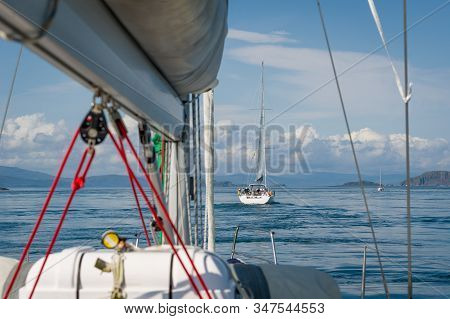 Sailing Yachts Fleet Flotilla At Scotland Waters. View From The Deck. Oban, Hebrides Islands.