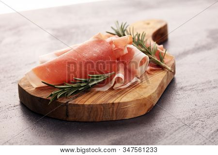 Dry Spanish Ham, Jamon Serrano, Bellota, Italian Prosciutto Crudo Or Parma Ham. Meat Cutting