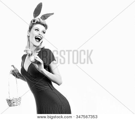 Woman Wearing A Mask Easter Bunny And Looks Very Sensually. Sexy Model Dressed In Costume Easter Bun