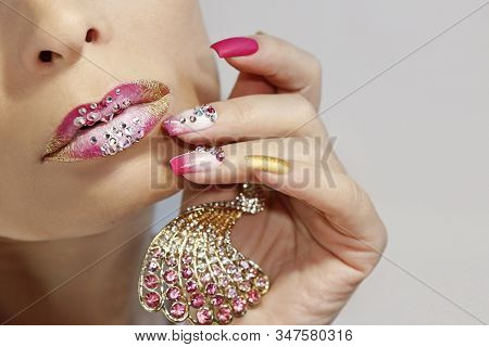 Creative Lip Makeup And Trendy Nail Art Manicure With Rhinestones.matte Nail Design With A Gradient 