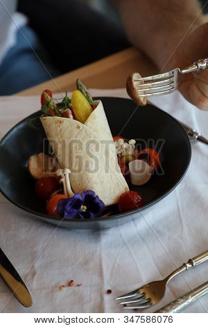 Shaverma Fruit Roll With Vegetables And Fruit And Sauce