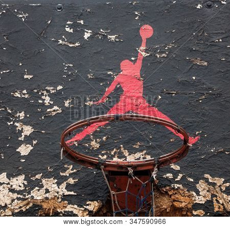 Kyiv, Ukraine -  February 1, 2018: Jumpman Logo By Nike Painted On The Old Black Backboard Of The Ba
