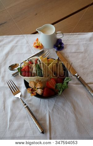 Shaverma Fruit Roll With Vegetables And Fruit And Sauce