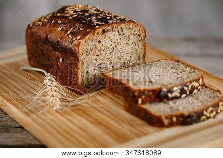 Whole Wheat Gluten Free Bread With Flax Seads Sunflower Chia Seads Sesame. Side View With Copy Space