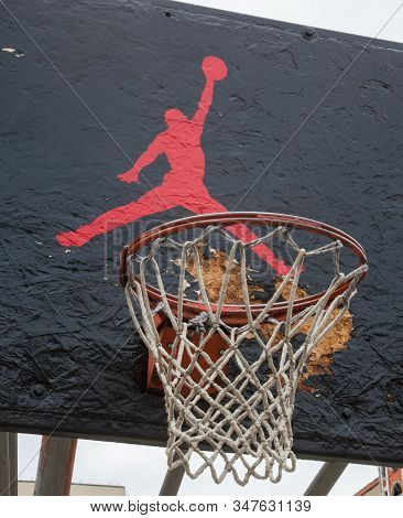 Kyiv, Ukraine -  April 21, 2016: Jumpman Logo By Nike Painted On The Black Backboard Of The Old Bask
