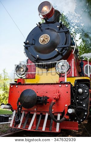 Old Soviet Steam Locomotive Blowing Off The Steam Out Of The Whistle