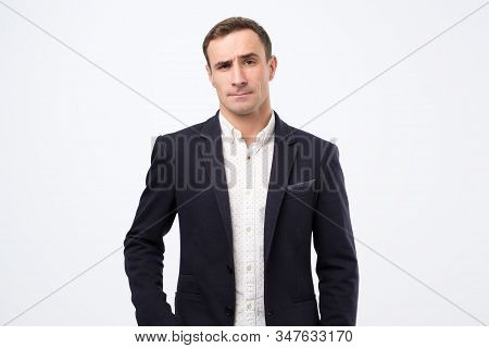 Man In Suit Wears Fashionable Clothes, Raises Eyebrows In Bewilderment, Has To Make Difficult Life C