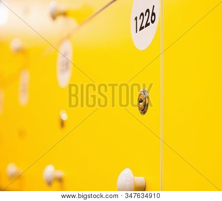 Lockers In The Locker Room. Bright Yellow And Red Doors.