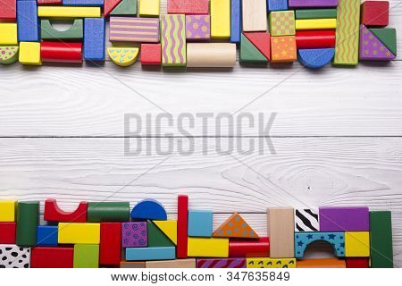 Kids Educational Developing Toys Frame On White Background. Top View. Flat Lay. Copy Space For Text