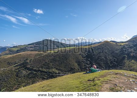 Deba, Gipuzkoa / Spain »; January 26, 2020: A Family Eating Peacefully On The Beautiful Coast From D