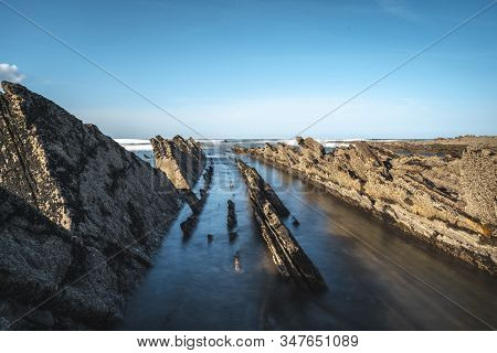 Long Exposure Geopark In Sakoneta On The Coast Of Deba At Sea. Basque Country
