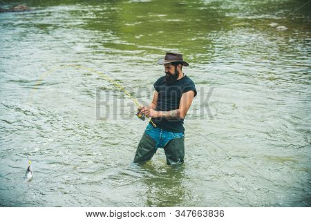 Man Catching Fish. Hobby And Recreation. Life Is Always Better When I Am Fishing. Fisher Have Long R