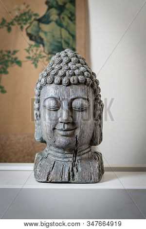A Sculpture Of Buddah Face For Spiritual And Zen Ambiant