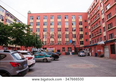 China, Heihe, July 2019: Cars In The Courtyard Of A Residential Building, The Streets Of The Chinese
