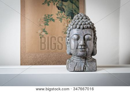 A Sculpture Of Buddah Face For Spiritual And Zen Ambiant