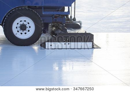 Special Machine For Cleaning Ice On An Ice Rink. Transport Industry. Street Ice Rink Service