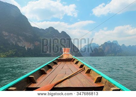 Wooden Longtail Boat Trip Adventure At Ratchaprapa Dam, Thailand.