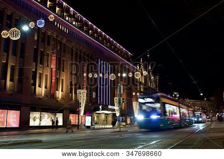 Helsinki, Finland - January 21, 2020: Tramway Traffic In Front Of The Department Store Stockmann Dec