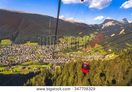 Aerial View Of Ortisei Or St Ulrich Mountain Village From Seuc Mount Cableway. Dolomites, South Tyro