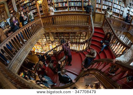 Porto, Portugal - January 20, 2020: Crowds Of Tourists Visit The Famous Bookstore Of Livraria Lello 