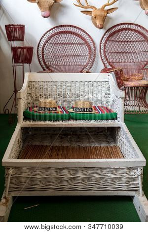 Camacha, Madeira, Portugal - April 19, 2018: Traditional Wicker Basket Sledges In A Factory Shop In 