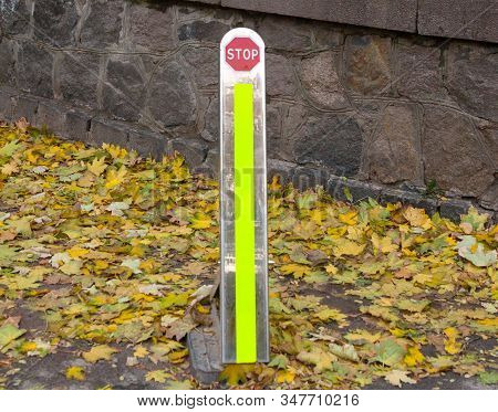Foldable Street Bollard. No Parking And No Entrance Post. Delineator. Stop Sign. Asphalt Covered Wit