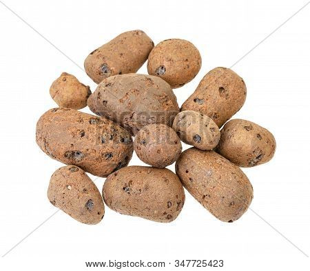 Top View Of Pile Of Lightweight Expanded Clay Aggregate Isolated On White Background