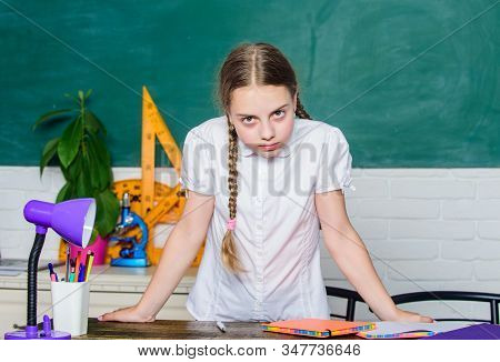 Hooked On Learning. Hometask Concept. Small Kid Study School. Girl Cute Child Sit School Classroom C
