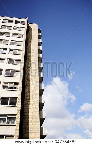 Multi Floor Old Soviet Union Architecture Building Bottom Up View On Blue Sky Background