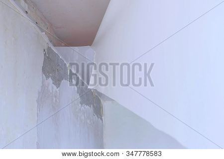 Process Of Dismantling Of Stretch Suspended Ceiling In Flat, Closeup View. Building And Construction