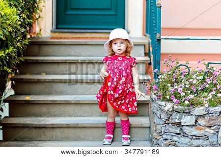 Portrait Of Beautiful Little Gorgeus Lovely Toddler Girl In Pink Summer Look Clothes, Fashion Dress,