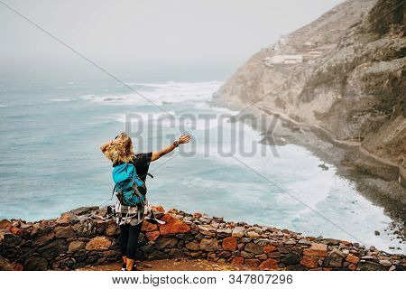 Santo Antao Island, Cape Verde. Tourist Female Enjoying View Of Atlantic Ocean Coastline On Hiking R