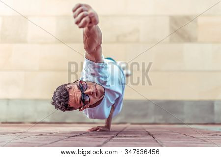 Man In Flight, Stands On One Arm, Superman Pose, Young Guy Dancer, In Summer In City, Dancing Street