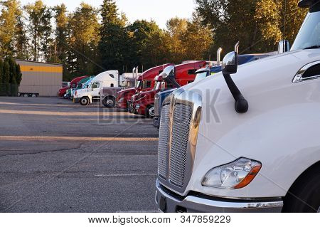 A Row Of Trucks During A Stopover, Travel Breaks. Stop For Trucks.