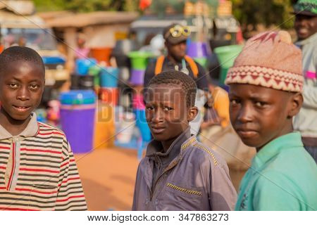 Bissau, Guinea-Bissau - January 5, 2020: portrait of African Kids looking at the camera in rural Guinea-Bissau