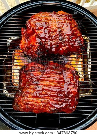 Bbq smoked pork butts on a smoker