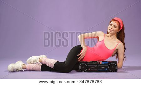 Woman Smiles Happily After An Active Aerobics Workout,