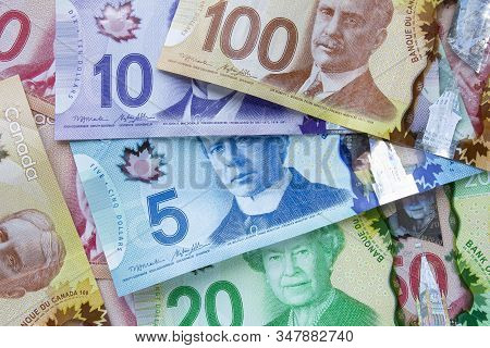 Calgary Alberta Canada. Jan 29, 2020. A Collage Of Canadian Currency Bills On Top Of Each Other.