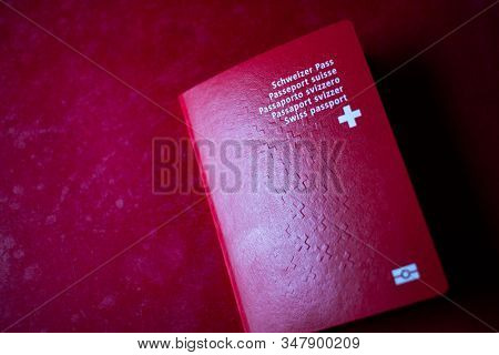  swiss passport on red background