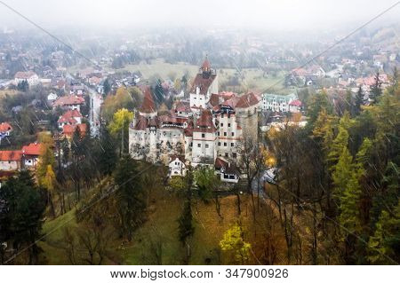 Aerial view of Dracula's Castle in the rain in Romania