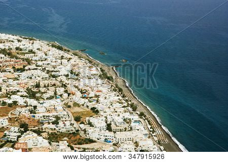 Kamari City Santorini Island. Mesa Vouno Mountain Top View Summer Holiday In Greece. Popular Tourist
