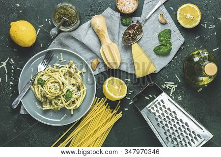 Italian Traditional Perciatelli Pasta By Genovese Pesto Sauce In Gray Dish Served With Ingradients O