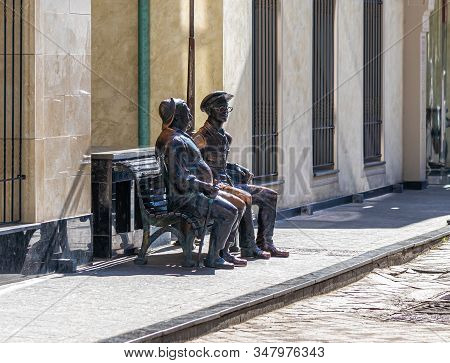 Tbilisi, Georgia, October 14, 2019 : Bronze Sculpture Of Two Men Sitting On A Bench On Ioane Shavtel