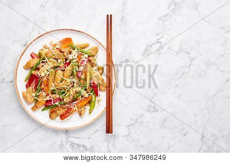 Chicken Chop Suey In White Plate On Marble Background. Chop Suey Is American Chinese Cuisine Dish Wi