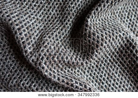 Crumpled Greyish Brown Woolen Fabric With Diamond Pattern