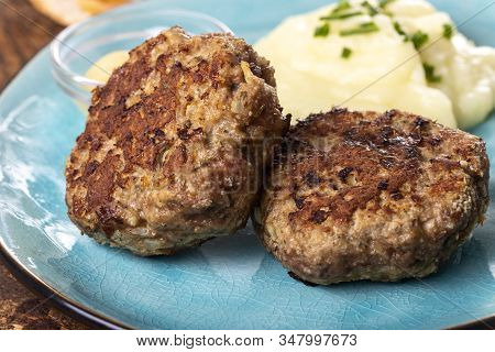 Two Bavarian Meat Loafs On A Plate