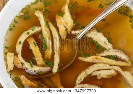 Overview Of A Bavarian Pancake Soup With Spoon